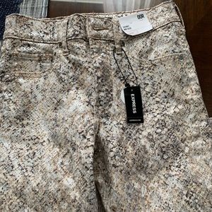 Express woman’s snakeskin jeans